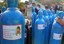 चीनले अनुदान दिएको अक्सिजन सिलिण्डर वन मन्त्रीकाे तस्बिर टाँसेर वितरण